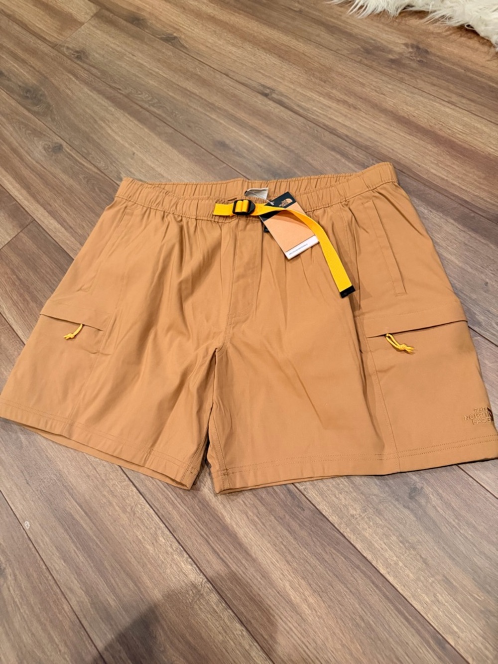 The North Face Tan Cargo Shorts with Yellow Accent Belt